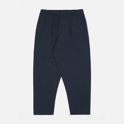 UNIVERSAL WORKS Pleated Track Pant in Navy