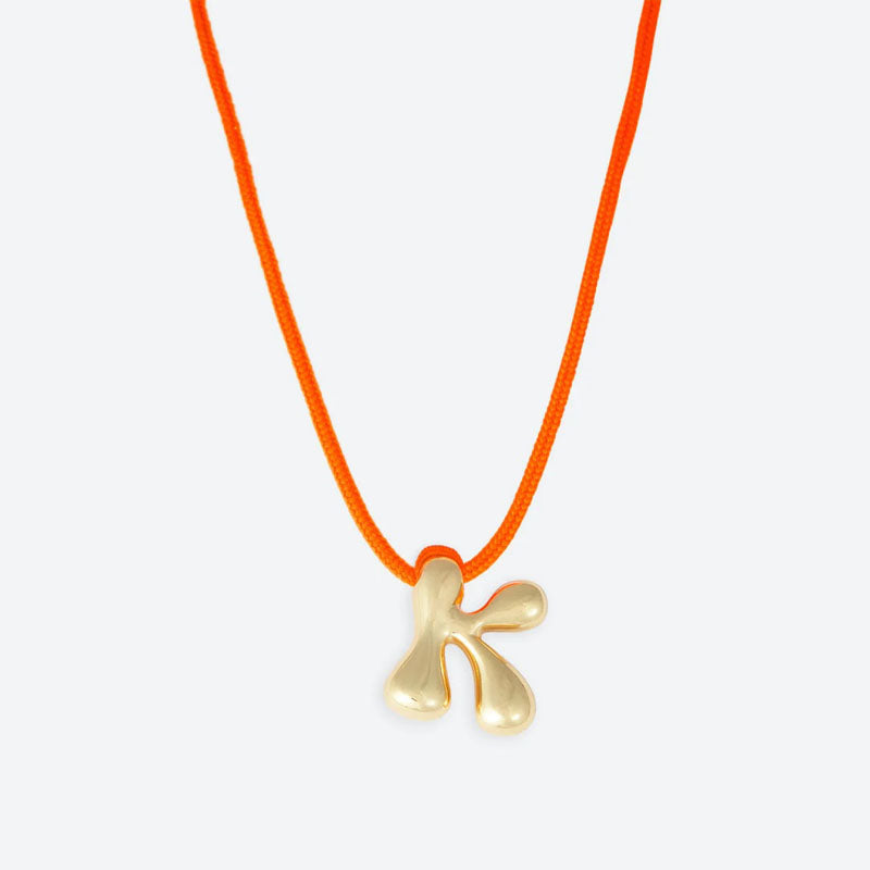 LA MOME BIJOU K Initial Joy Letter Necklace in Gold